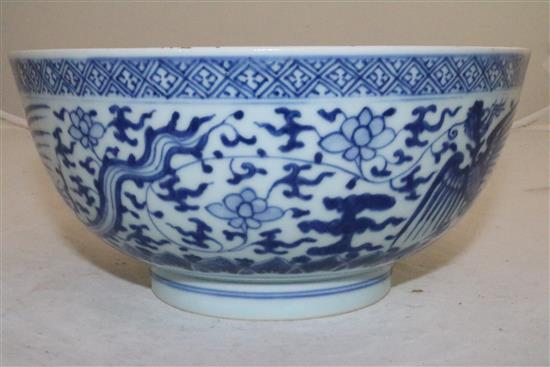 A Chinese blue and white phoenix bowl , Kangxi/Yongzheng period, 21.5cm, cracks